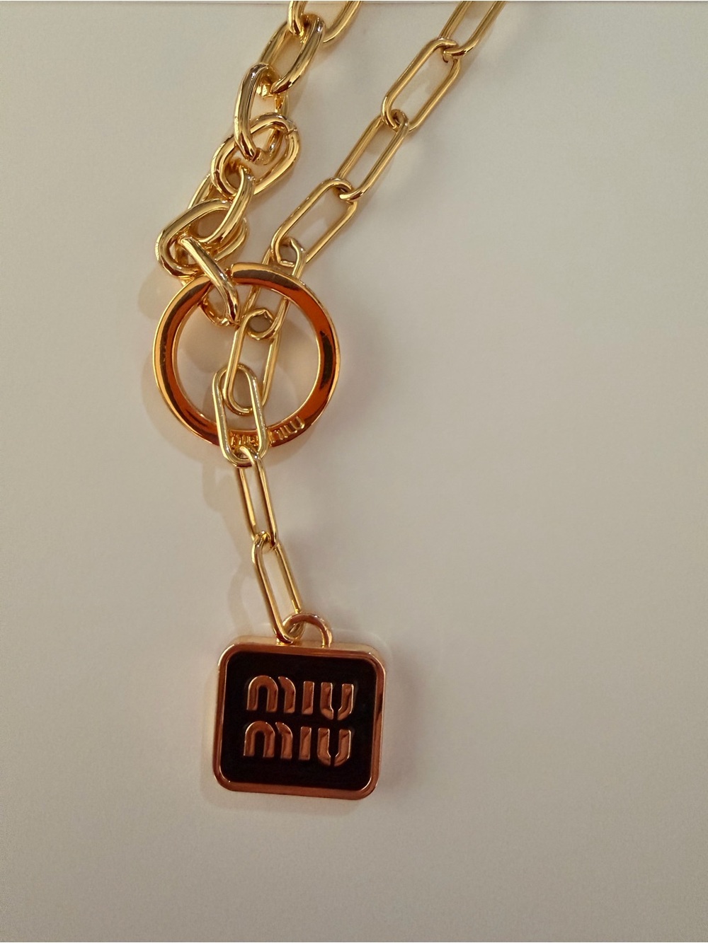 Miu Miu 20’ Gold Chain with Black Enamel Logo Charm